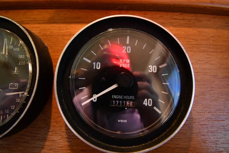 Slide: The Image of Tachometer of 2000 Mainship 390 Trawler showing RPM and engine hours. - 51