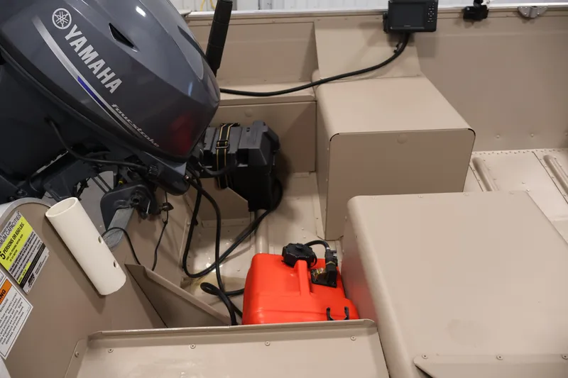 Slide: The Image of 2019 Polar Kraft Outlander 156 T boat interior with Yamaha motor and equipment. - 23