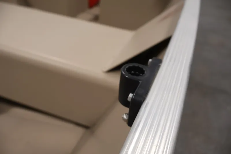 Slide: The Image of Close-up of a 2019 Polar Kraft Outlander 156 T boat detail, featuring a mounted accessory bracket. - 14