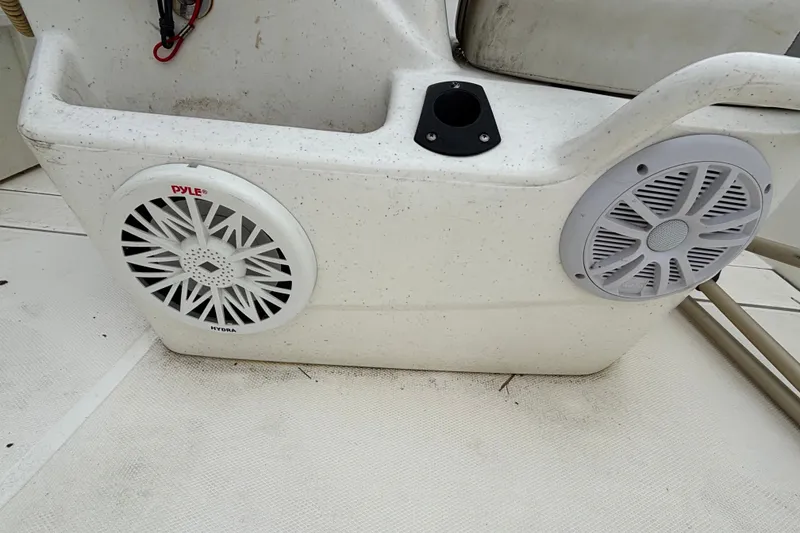 Slide: The Image of 2021 Mako Pro Skiff 17 CC boat with Pyle Hydra marine speakers installed. - 14