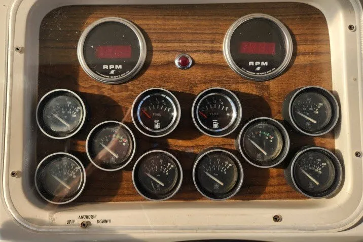 Slide: The Image of Dashboard of a 1987 Ocean Yachts 48 Super Sport with RPM and fuel gauges. - 47