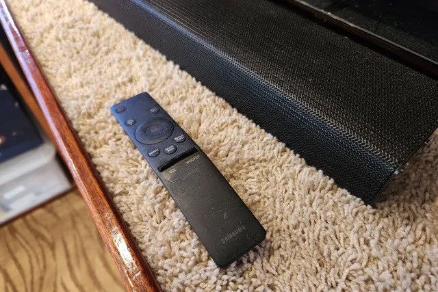 Slide: The Image of Remote control on carpeted surface inside 1987 Ocean Yachts 48 Super Sport. - 14