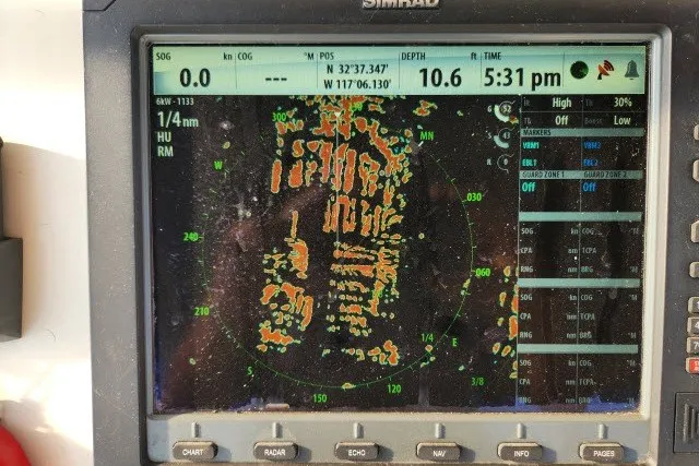 Slide: The Image of Simrad marine radar display on 1987 Ocean Yachts 48 Super Sport, showing navigation data. - 46