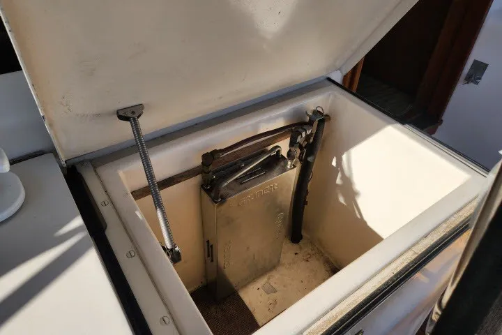 Slide: The Image of Open storage compartment on a 1987 Ocean Yachts 48 Super Sport boat. - 42