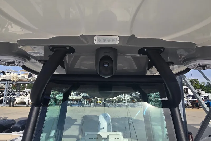 Slide: The Image of 2024 Caymas 281 HB boat roof with mounted camera and support structures. - 37