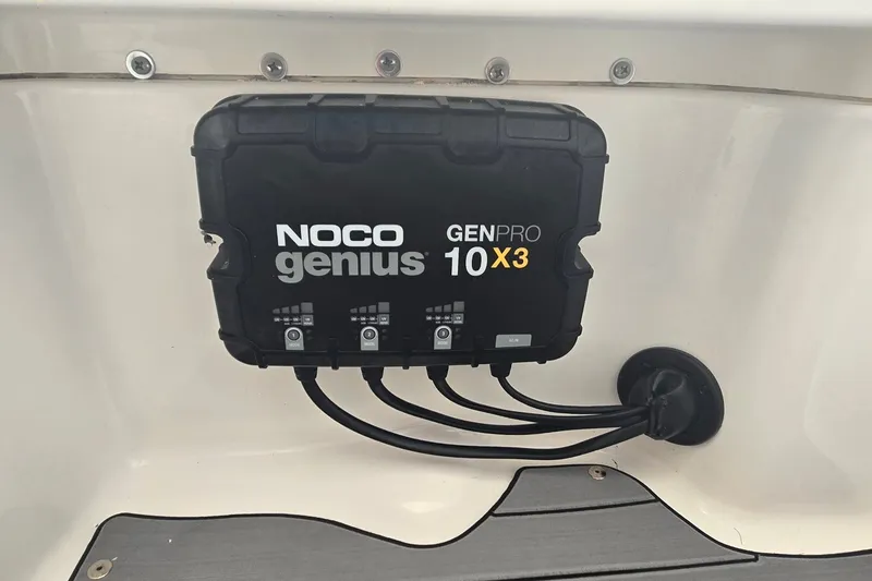 Slide: The Image of NOCO Genius GENPRO 10X3 charger installed on 2024 Caymas 281 HB boat. - 38