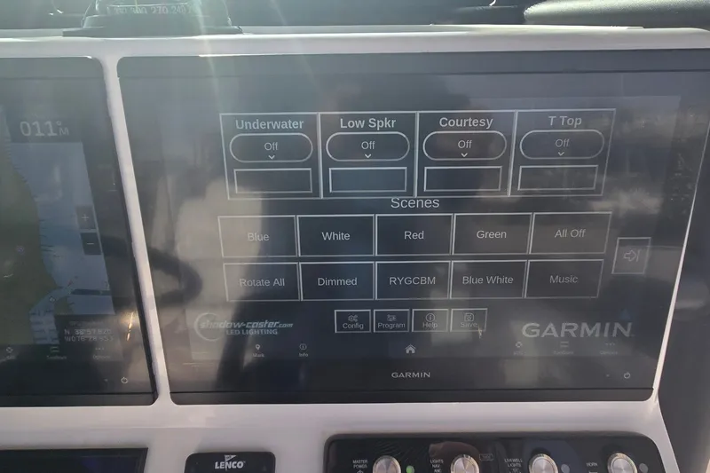 Slide: The Image of Garmin control panel on 2024 Caymas 281 HB boat, displaying lighting options. - 40