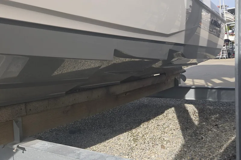Slide: The Image of 2024 Caymas 281 HB boat hull on trailer, side view. - 8