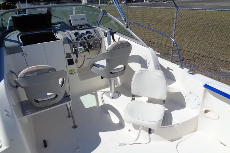 Slide: The Image of 2007 Bayliner 2052 Trophy Walkaround DX/LX boat interior with steering wheel and seating. - 20