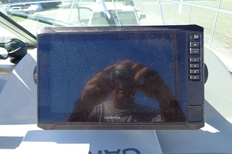 Slide: The Image of Garmin marine GPS on 2007 Bayliner 2052 Trophy Walkaround DX/LX boat dashboard. - 17