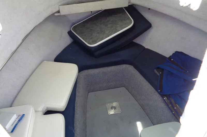 Slide: The Image of Interior cabin of 2007 Bayliner 2052 Trophy Walkaround DX/LX boat with seating and storage. - 9