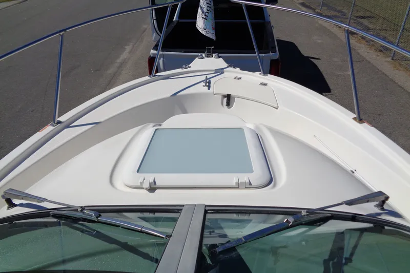 Slide: The Image of 2007 Bayliner 2052 Trophy Walkaround DX/LX boat deck with windshield and hatch. - 8