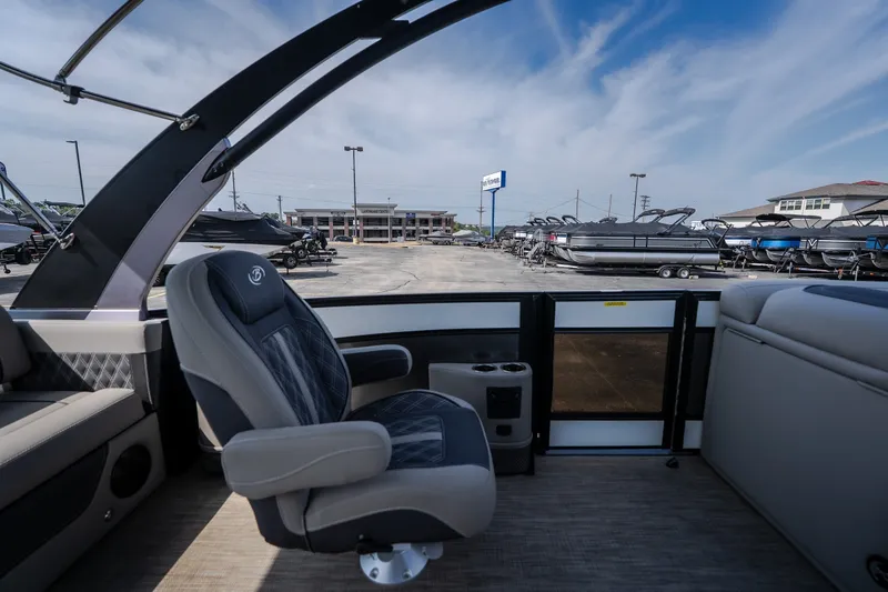 Slide: The Image of 2023 Barletta Lusso 25UCA pontoon boat interior with luxurious seating and modern design. - 29