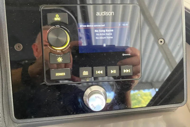 Slide: The Image of 2023 Barletta Lusso 25UCA audio system with Audison display, showing no song information. - 15