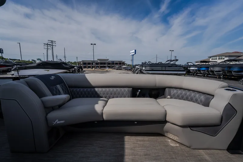 Slide: The Image of 2023 Barletta Lusso 25UCA pontoon boat with luxurious seating and modern design. - 39