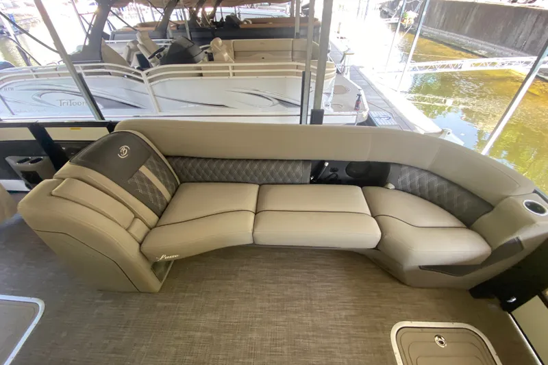 Slide: The Image of Luxurious seating on 2023 Barletta Lusso 25UCA pontoon boat, featuring elegant upholstery. - 30
