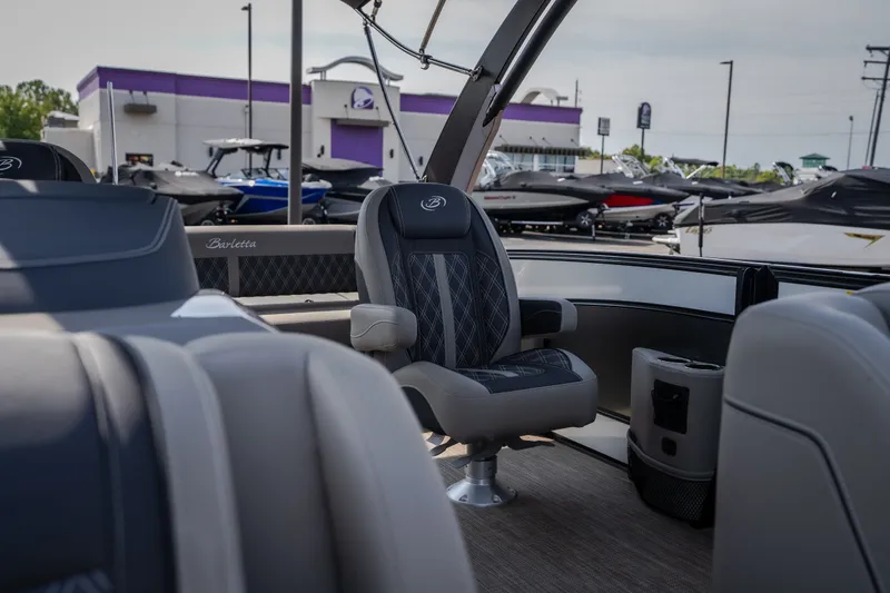 Slide: The Image of 2023 Barletta Lusso 25UCA pontoon boat interior with luxurious seating and modern design. - 40