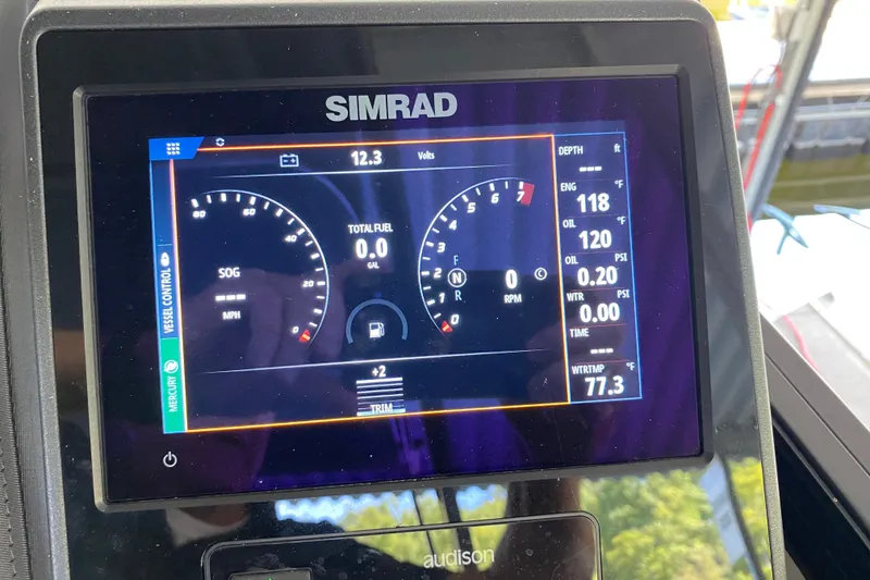 Slide: The Image of Simrad display on 2023 Barletta Lusso 25UCA showing vessel controls and engine data. - 23