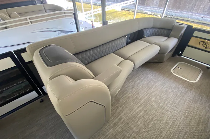 Slide: The Image of Luxurious seating on 2023 Barletta Lusso 25UCA pontoon boat, featuring elegant design and comfort. - 17