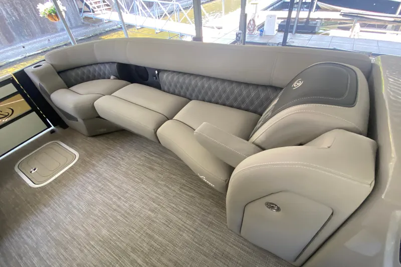 Slide: The Image of Luxurious seating on 2023 Barletta Lusso 25UCA pontoon boat, featuring elegant upholstery. - 29