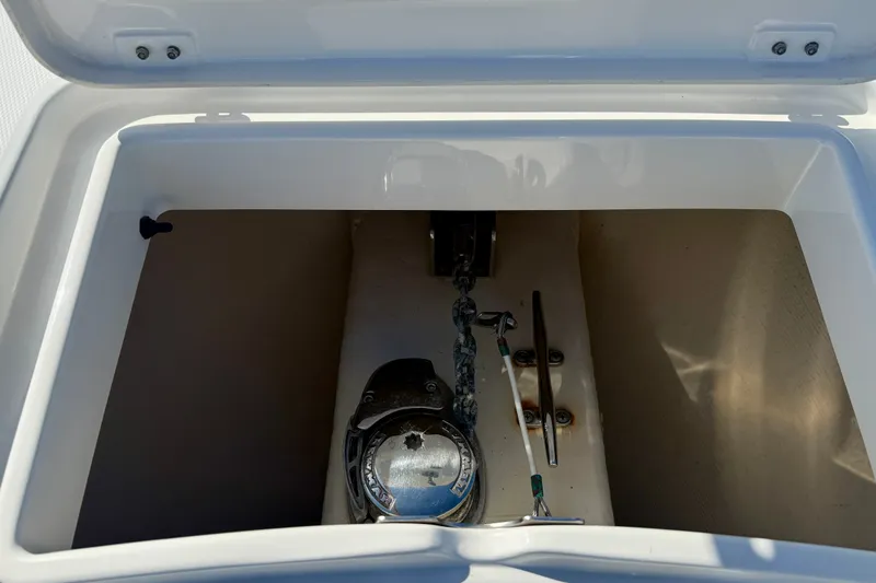 Slide: The Image of Anchor compartment of 2014 Regulator 28 Forward Seating boat. - 21