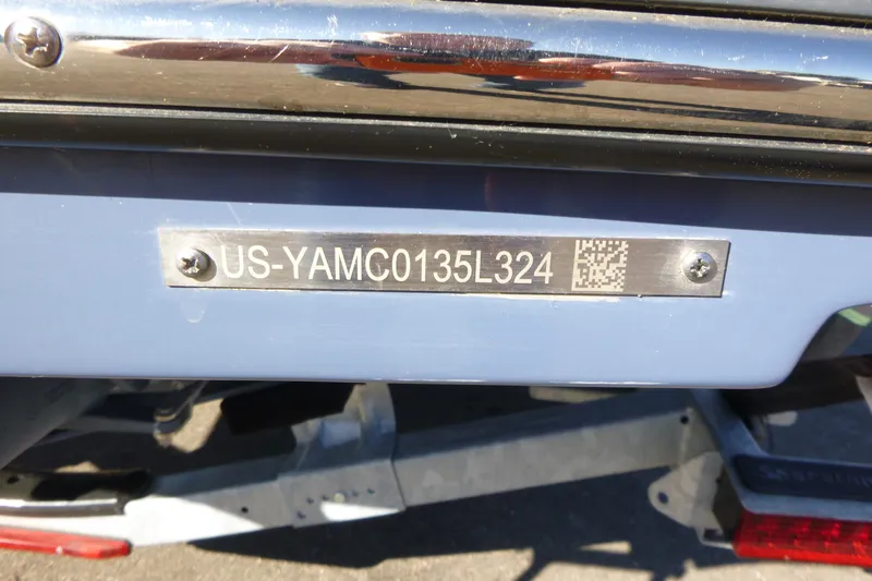 Slide: The Image of 2024 Yamaha Boats 255XD hull identification number plate with QR code. - 19