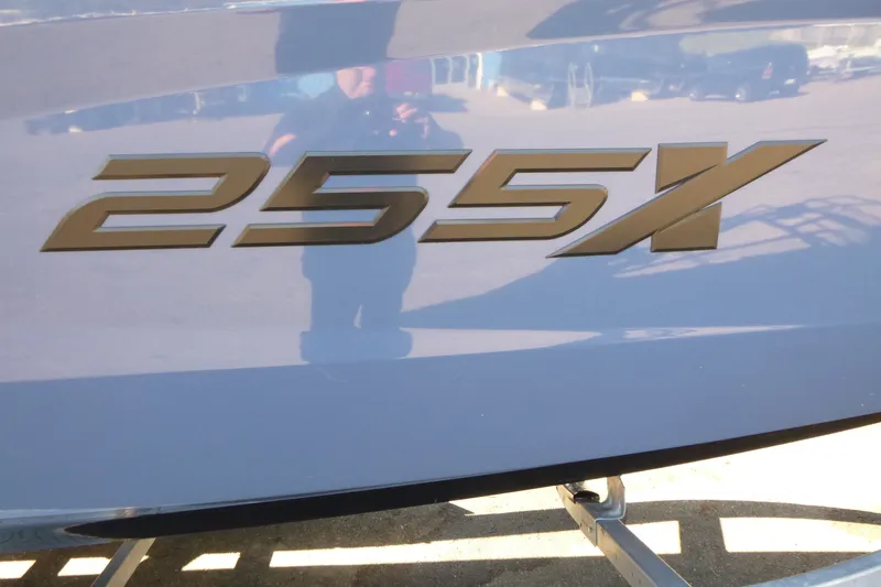 Slide: The Image of 2024 Yamaha Boats 255XD model logo on boat exterior. - 18