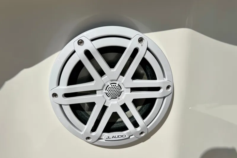 Slide: The Image of White JL Audio speaker on 2027 Robalo R250 Center Console boat. - 25