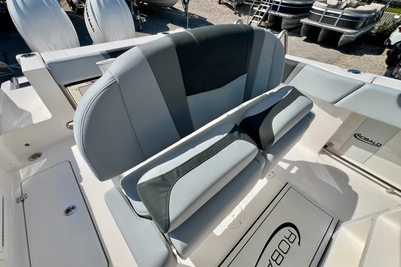 Slide: The Image of 2027 Robalo R250 Center Console boat seating and deck detail. - 14