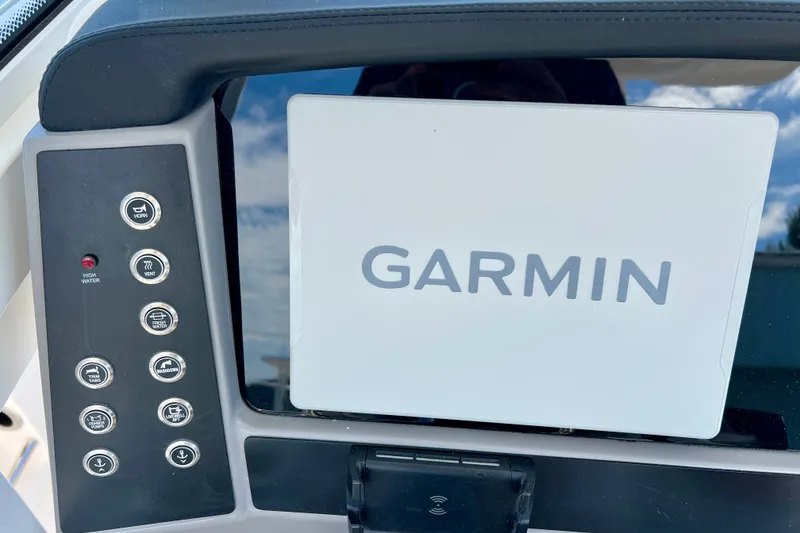 Slide: The Image of Control panel of 2027 Robalo R250 Center Console with Garmin display. - 17