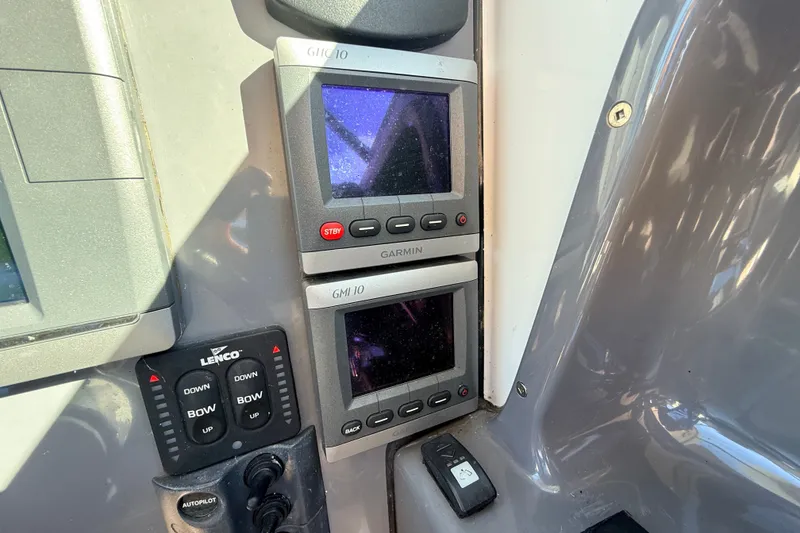 Slide: The Image of Garmin marine electronics on 2011 Protector Tauranga 38 boat dashboard. - 25