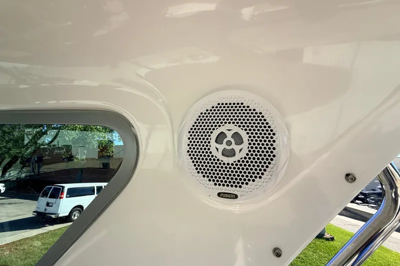 Slide: The Image of Speaker on 2011 Protector Tauranga 38 boat interior, with window view. - 35
