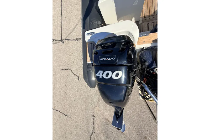Slide: The Image of Outboard motor on 2011 Protector Tauranga 38 boat, featuring Verado 400 engine. - 48