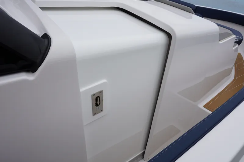 Slide: The Image of 2027 Monterey Elite 34 OB boat interior detail with sleek white finish. - 29