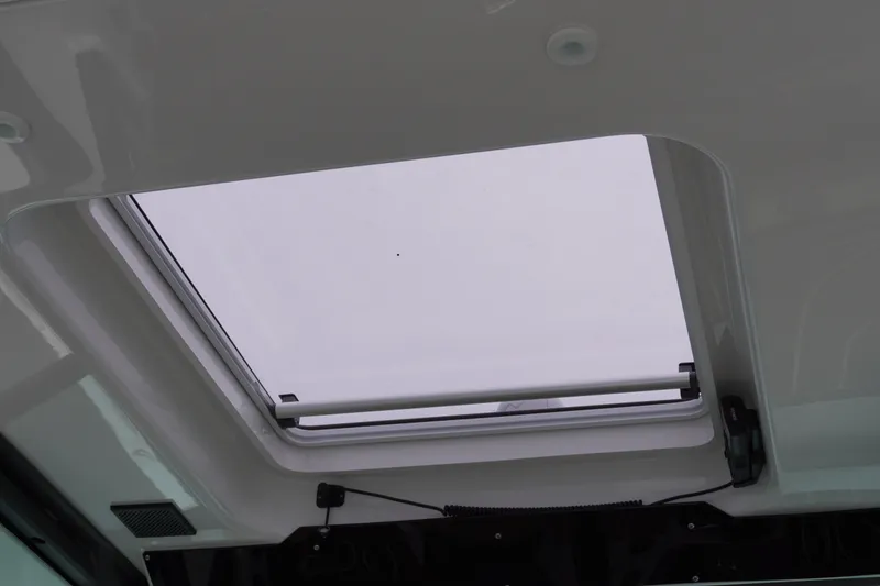 Slide: The Image of Skylight view inside 2027 Monterey Elite 34 OB boat, showcasing modern design. - 26