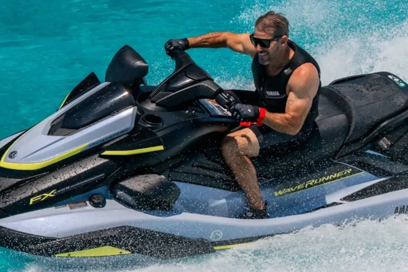 Slide: The Image of Man riding 2027 Yamaha WaveRunner FX SVHO on clear blue water. - 8