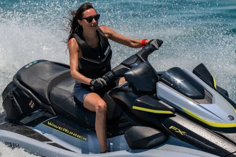 Slide: The Image of Woman riding 2027 Yamaha WaveRunner FX SVHO on water, wearing life jacket. - 6