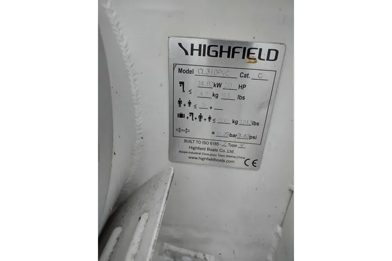 Slide: The Image of Label on Highfield CL310PVC boat, detailing specifications and capacity information. - 20
