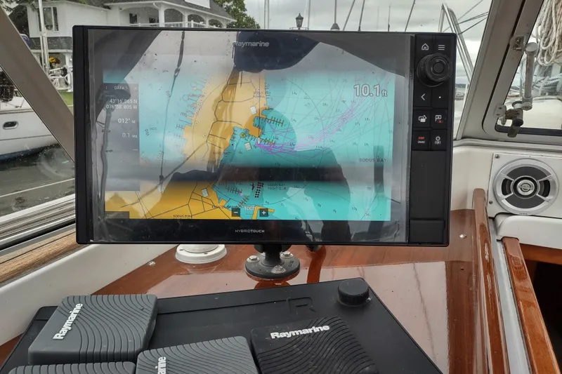 Slide: The Image of Navigation system on a 2005 Hallberg-Rassy 43 sailboat displaying nautical charts. - 30