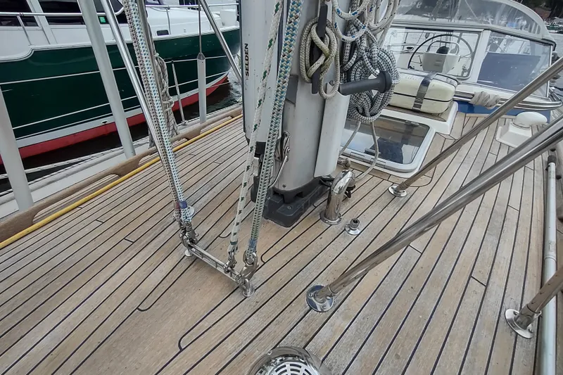 Slide: The Image of Deck of 2005 Hallberg-Rassy 43 sailboat with ropes and fittings visible. - 18