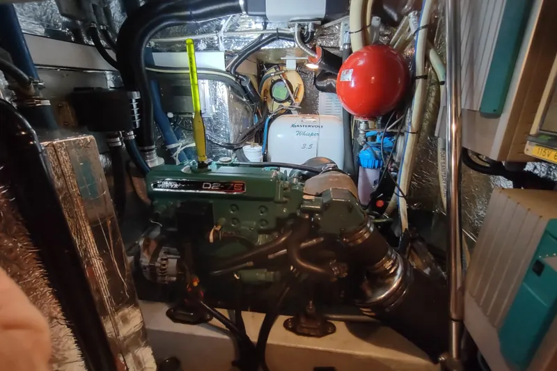 Slide: The Image of Engine room of a 2005 Hallberg-Rassy 43 yacht with Volvo Penta D2-75 engine. - 60