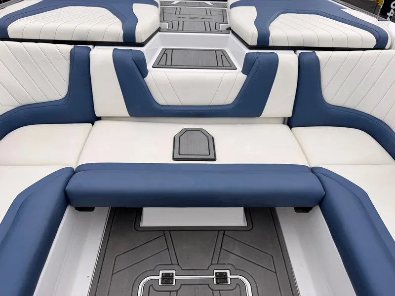 Slide: The Image of The 2021 Tigé 22RZX features luxurious blue and white upholstery with a modern, stylish design. - 21