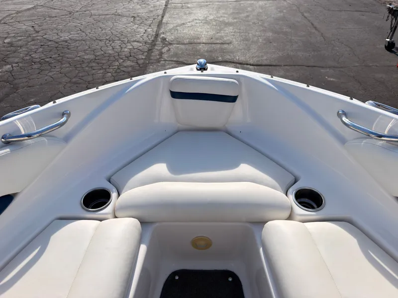 Slide: The Image of The 2008 Regal 1900 Bowrider features white upholstery and stainless steel cup holders. - 33