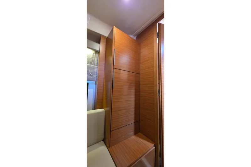 Slide: The Image of Interior of 2015 Bavaria 360 Sport HT yacht with wooden cabinetry and modern design. - 42