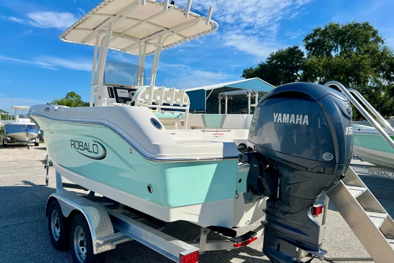 Slide: The Image of 2024 Robalo R200 Center Console boat with Yamaha engine on trailer. - 6