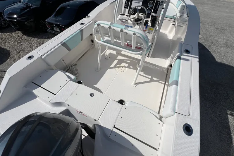 Slide: The Image of 2024 Robalo R200 Center Console boat interior with steering console and seating. - 7
