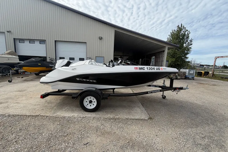 The Image of 2019 Scarab 165 G boat on trailer outside a storage facility. - 0