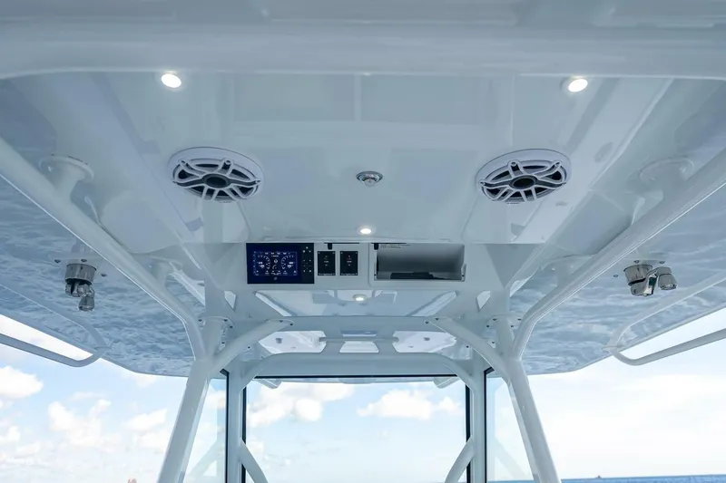 Slide: The Image of 2023 Yellowfin 39 Offshore boat interior with speakers and control panel. - 48