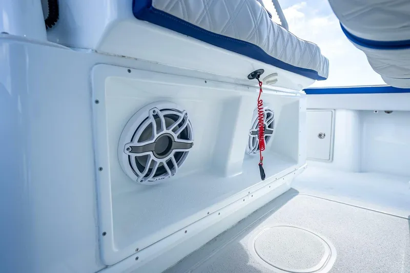 Slide: The Image of 2023 Yellowfin 39 Offshore boat interior with speakers and seating detail. - 53