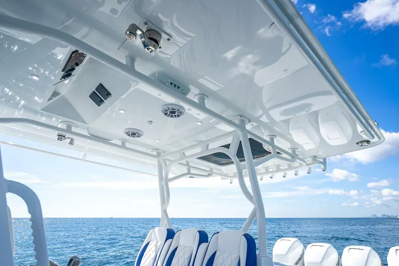 Slide: The Image of 2023 Yellowfin 39 Offshore boat interior with ocean view and blue sky. - 54